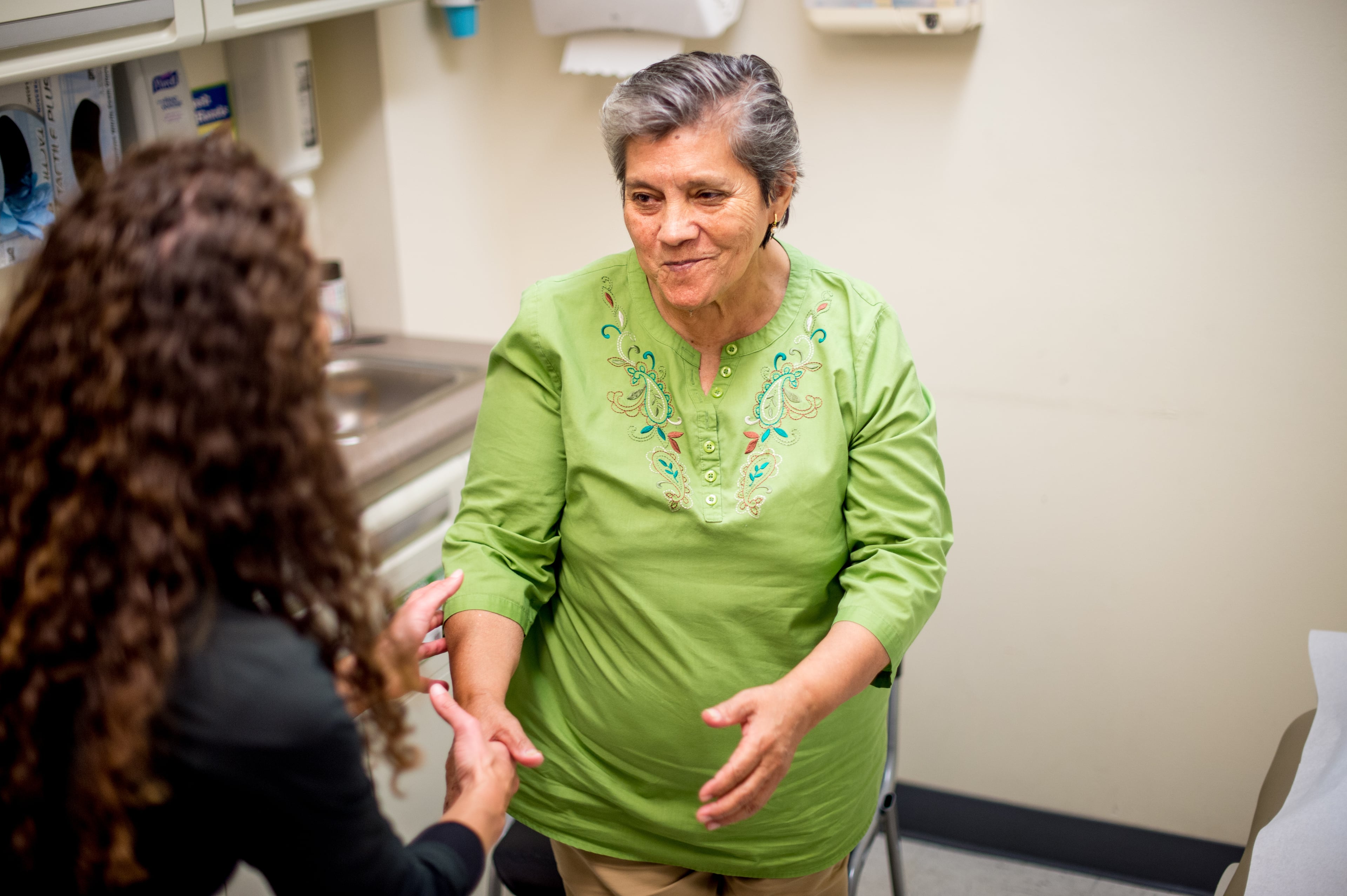 A pediatrician with a young MNHC patient